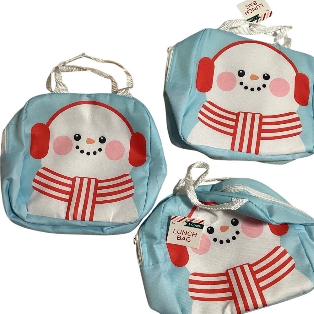 Snowman Lunch Bag with Blue and Red Details. 3 are included in this listing.